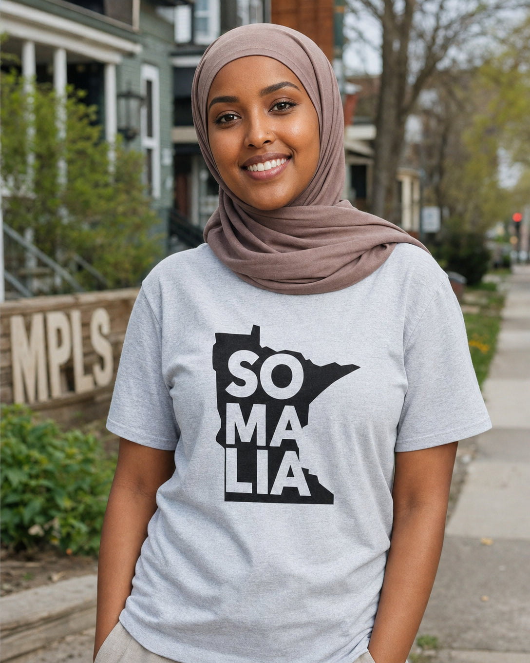 Somalia in MN T-Shirt — lifestyle photo | Origins Clothing Co