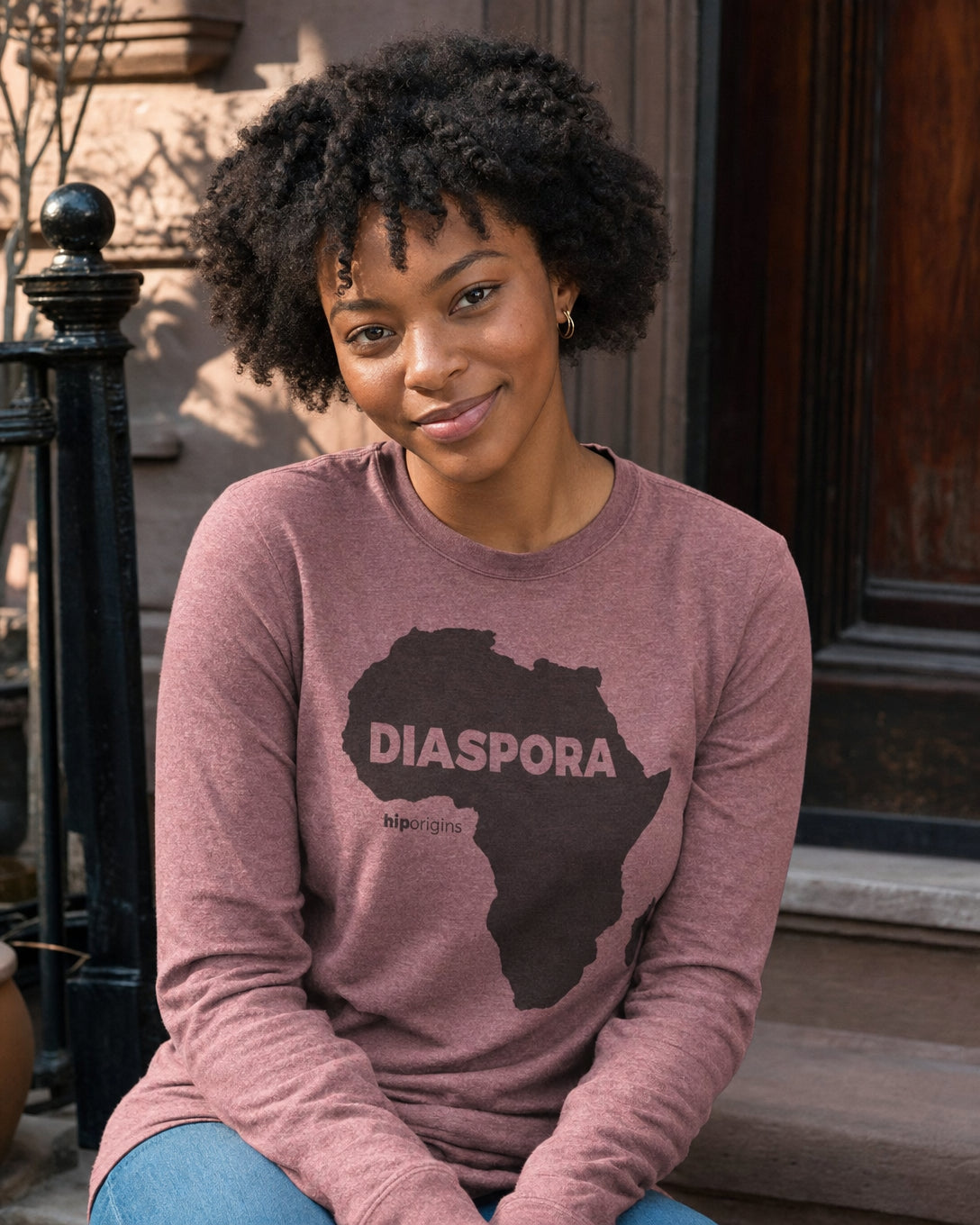 Black Diaspora Unisex Long Sleeve Tee — lifestyle photo | Origins Clothing Co